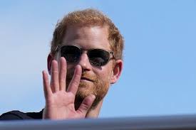 Prince Harry settles a tabloid phone hacking claim and says his mission to  tame the media continues