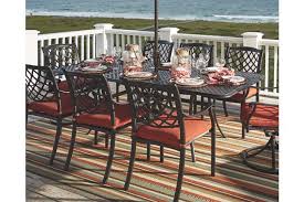 Elegant And Inviting The Tanglevale Rectangular Extension Dining Table Reinvents How You Savo Concrete Dining Table Outdoor Accent Table Outdoor Dining Chairs