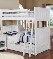 The bunk bed offers many features including safety guardrails, an integrated ladder, and the option of easily and safely converting into two twin beds for your convenience. Resort Life Cameron Twin Over Twin Bunk Bed In White Summerlin Collection
