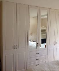 Standard double doors are best, assuming there's room to swing them open. A Fitted Wardrobe With Mirrors And Drawers At Newhaven Kitchens And Bedrooms Carlow Bedroom Furniture Design Bedroom Interior Bedroom Built In Wardrobe