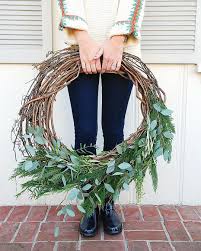 Plant materials there are lots of plants that work for a foraged fall wreath that you can use. A Grapevine Wreath With Eucalyptus And Seasonal Greenery Grapevine Wreath Grape Vines Wreaths