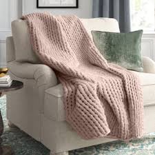 Tired of curling crochet and tight foundation chains? Chunky Knit Throw Pink Wayfair