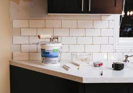 Installed a subway tile backsplash between the countertop and cabinets in your kitchen makes a great diy project. How We Installed Our Subway Tile Backsplash Brittany Stager