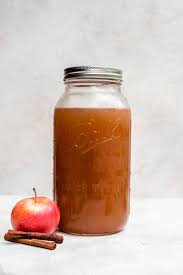 In a large stock pot add apple cider, apple juice, brown and granulated sugar and cinnamon sticks. Apple Pie Moonshine