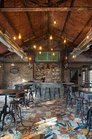 Beautifully Redeemed Old Warehouse Space In A Goan Village Called Soro The Local Word For Alcoho Pub Design Coffee Shop Interior Design Cafe Interior Design