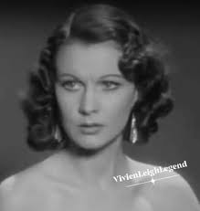 Vivien Leigh poses for the camera with her first husband, Herbert Leigh  Holman. He looks quite handsome in this photo and it's easy to see why she  fell for him. Holman also