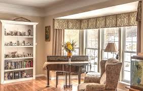 The soft blues, creams and dark woods give the impression of luxury and calm. Let The Sun Shine Into Your Home With Bay Windows