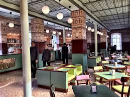 Il Bar Luce Di Wes Anderson A Milano Da Grand Budapest Hotel Alla Nuova Fondazione Prada Wes Anderson Restaurant Wes Anderson Design Italian Bar