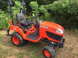 Kubota Bx1870 New Price Specs Reviews Attachments Features 2013 kubota tractor bx2370 diesel 4x4 with 60 inch belly mower, front loader, and 25 gallon sprayer.
