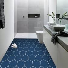 geometric shapes are a trend thats here to stay and theres no reason that hexagons shouldnt be up for considerat tile floor vinyl flooring bathroom floor tiles