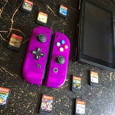 Neon Purple Joy Con In Both Natural And White Light Http Egamephone Com Index Php Rt Product Produc Buy Nintendo Switch Nintendo Switch Games Nintendo