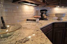 White Ice Granite And Creamy Backsplash Tile White Ice Granite Granite Countertops Kitchen Granite Kitchen