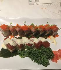 Just minced garlic and the concoction known as spicy tuna roll is about as authentically japanese as a sea urchin shooter. Spicy Tuna Crunch Roll And Dynamite Roll Picture Of Amura Japanese Restaurant Lake Mary Tripadvisor