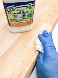 Wipe The Surface Of The Table Down With Mineral Spirits Before Applying The Grey Wood Stain Grey Stained Wood Staining Wood How To Clean Furniture