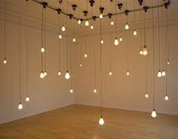 Installation Art Installation Art Featuring A Collection Of Moving Hanging Lightbulbs Hanging Art Installation Lamp Installation Light Bulb Art