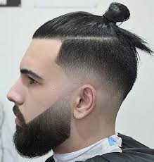 Bald fade haircuts that cut hair all the way down to the skin are a top trend for men. 40 Modern Low Fade Haircuts For Men In 2020 Men S Hairstyle Tips Man Bun Hairstyles Man Bun Haircut Low Fade Haircut