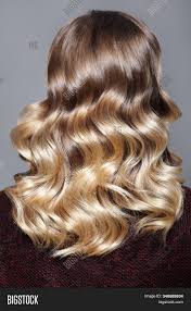 You can use a tangle teezer or denman brush. Beautiful Shiny Curly Image Photo Free Trial Bigstock