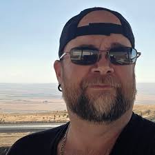 Where can I get an upgraded headlight for my motorcycle?