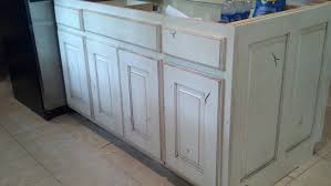 White Painted And Distressed Knotty Alder Cabinets Knotty Alder Cabinets Alder Cabinets Distressed Kitchen Cabinets White