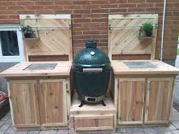 The result of which provides you with confidence in knowing big green egg has stood behind its amazing products for over three decades. Diy Large Big Green Egg Stand Built Out Of Cedar Storage Under Left Side For Coals And Garbage Right Green Egg Stand Bbq Setup Big Green Egg Outdoor Kitchen
