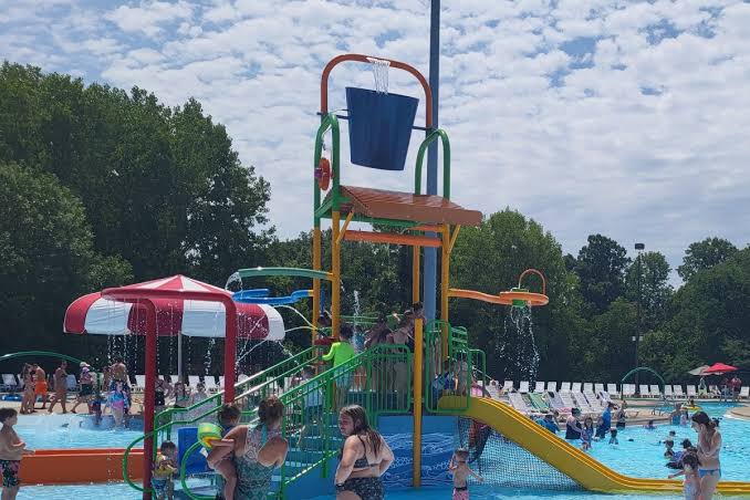 Local splash pads keep families cool all summer, AI generated