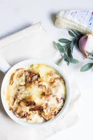 Tartiflette The Ultimate Cheesy Potato Bake With Bacons And Creamy Brie Recipe Via Monpetitfour C Typical French Food Classic French Desserts Cheesy Potatoes