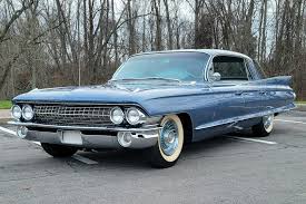 Image result for Dresden Blue 1961 Cadillac
