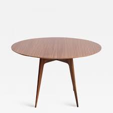 For subtler interior, you should definitely look closely at round kitchen tables of any model listed on this page. Italian Modern Round Wooden Dining Table