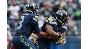 That's what's happening in this video: Marshawn Lynch Wallpaper Full Russell Wilson And Marshawn Lynch Wallpapaet 2977952 Hd Wallpaper Backgrounds Download
