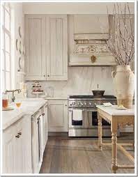 Follow the grain when you rub, and when your rag becomes tacky switch it out for a new one; Whitewash Cabinets By Nikkipw Kitchen Remodel Whitewash Kitchen Cabinets Grey Kitchen Cabinets
