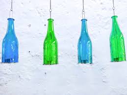 How cool is this shelving unit made of wine bottles and wood? Diy Crafts You Can Do With Leftover Wine Bottles Oola Com