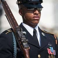 Sergeant (SGT) Robert H. Neidlinger, 3rd Infantry (The Old Guard), inspects  his Joint Honor Guard prior to the unit's participation in inaugural  ceremonies for George H.W. Bush, 41st president of the United