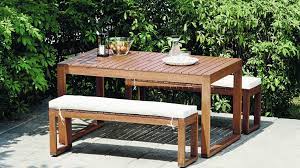 This vintage metal garden bench and coffee table may have been rusted by time but they're still fully a set of high rise chairs showing the wear and tear of years. The Perfect Garden Picnic Table Benches Out Out