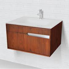 The cap discretely conceals drain holes. Decolav Friedmans Home Experience Long Beach California