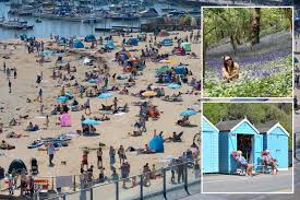 Brits say goodbye to balmy 22C weekend as temps set to plunge in parts of UK with heavy rain and thunder TODAY