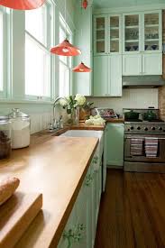 The cabinet color would be bold, but pairing it with green tiles took it to the next level. Most Popular Kitchen Cabinet Paint Color Ideas For Creative Juice