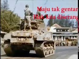 Simanjuntaklirik lagu maju tak gentar:maju tak gentarmembela yang benarmaju tak gentarhak kita. Lagu Wajib Nasional Maju Tak Gentar Youtube