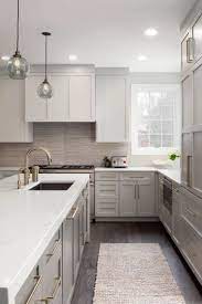 20 gorgeous rooms that prove rugs belong in the kitchen in 2021 modern grey kitchen timeless kitchen kitchen design