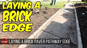 Trades & services trades & services subclassification: Laying A Brick Paver Edge On A Pathway Landscaping Job On The Weekend Youtube