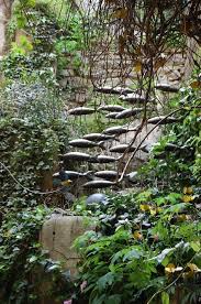 Fish Sculptures In The Garden Garden Art Garden Structures Fish Sculpture