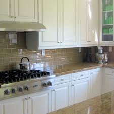A large peninsula overlooks the dining and living room for an open concept. Kitchen Backsplash Pictures Subway Tile Outlet