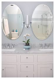 Opt for a minimalist frameless model or one with a coloured frame. Double Sink With Oval Mirrors Traditional Bathroom Seattle By Mrf Construction Inc