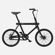 The T Series Urban Compact Cruiser Bicycle From Vanmoof Features 2 Gears An Anodized Aluminum Frame Front And Rear Disc Bra Fahrrad Mini Bike Fahrrad Design