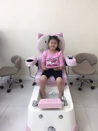 Nail Salon With Kid Chairs Lovely The Kid Is Enjoin The Hello Kitty Pedicure Spa Chair In 2020 Pedicure Spa Kids Chairs Nail Salon