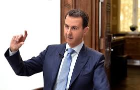 Syrian president bashar assad and his wife asma vote at a polling station during the presidential elections in the town of douma, near the syrian capital damascus, syria, may 26, 2021. A Collapsing Economy And A Family Feud Pile Pressure On Syria S Assad