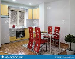 dining area with red leather chairs