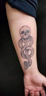 The dark mark is a licensed image of warner bros and rowling but if you could manage to find someone that would do it the cost would vary but typically about $100 for one that size if you don't want it looking too professional. Dark Mark Tattoo Fresh Dark Mark Tattoos Mark Tattoo Harry Potter Tattoos