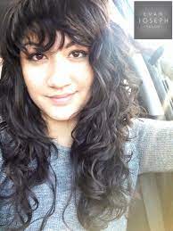 A longer layered hairstyle is the best for frizzy curls. Short Layers And Fringe On Naturally Wavy Hair Natural Curls Hairstyles Curly Hair Styles Natural Wavy Hair
