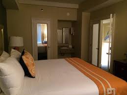 Across from one sink is the bathtub. Bedroom Plus Vanity Sink And Inside The Door With Mirror Is A Giant Walk In Closet Picture Of Graduate Providence Tripadvisor