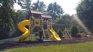 Building a playground slide in your backyard is a challenging activity as you have to ensure the children are safe when using the slide. Swing Set Construction Superior Materials Swing Kingdom